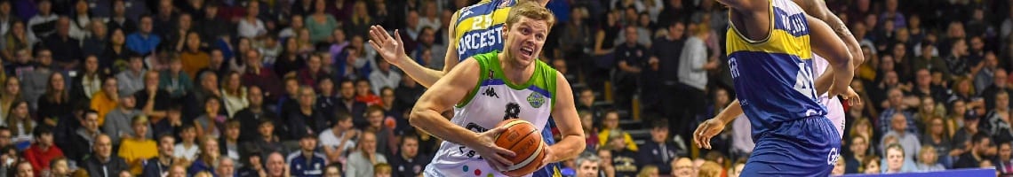 Manchester Giants Basketball player Ingus Bankevics against Worcester Wolves players